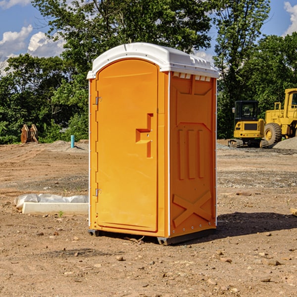 how often are the portable restrooms cleaned and serviced during a rental period in Dana KY